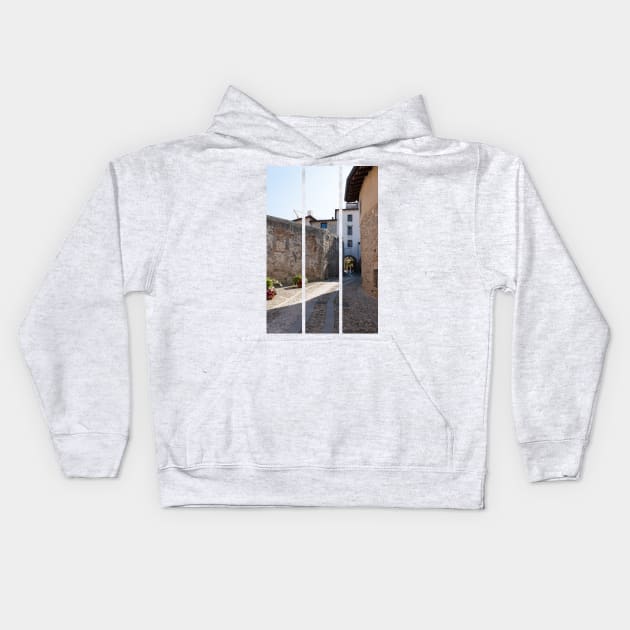 North Italy Life in the center of the lombard medieval city. Walking through narrow streets and walls. Sunny summer day. (vertical) Kids Hoodie by fabbroni-art